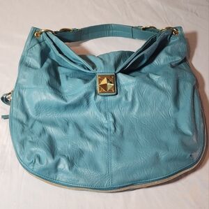 Mark. Aqua Blue Faux Leather Expandable Handbag